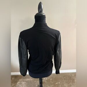 Women’s Mixed Media Black Mock Sweater with Faux Leather Sleeves